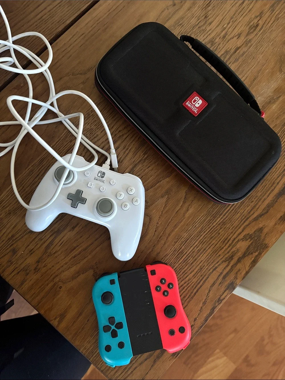 Nintendo Neon Blue & Neon Red Joy-Con Pair with White Wired Pro Controller